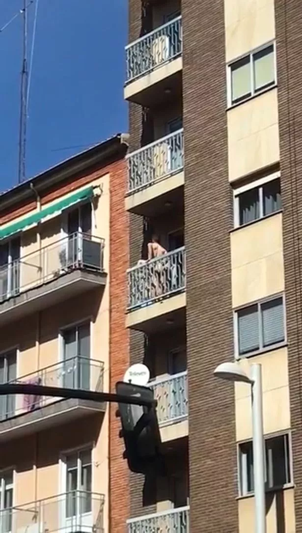 Couple having balcony apartment