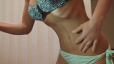 Skinny girls belly bloated packed after